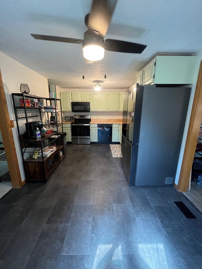 Kitchen and dining with new plank floors
